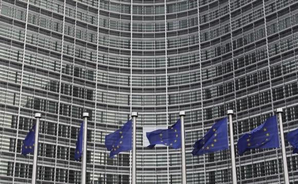 EU flags are seen outside the EU Commission headquarters in Brussels